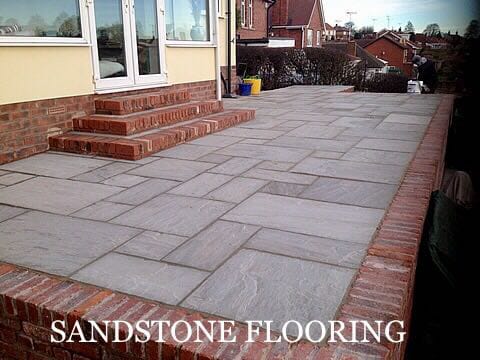 Sandstone paving slabs Kandla Grey installed outdoors