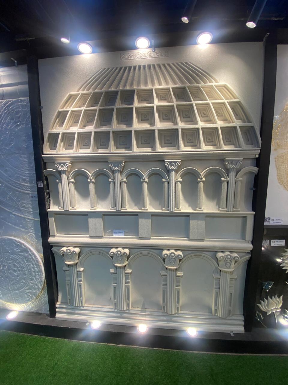 Decorative carved natural stone wall panel